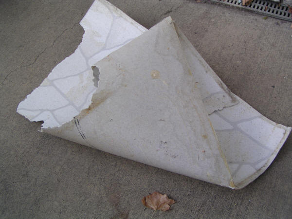 tear out old linoleum floor first